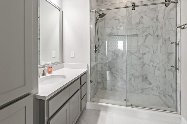 5318 Abington Creek Ln, Sugar Land, TX 77479 - full bath featuring a marble finish shower, vanity, and marble look tiles