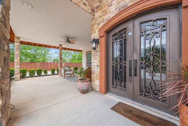 8917 Hawk Rd, Pearland, TX 77584 - entrance to property with stone siding and ceiling fan