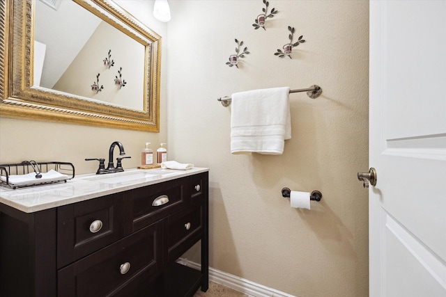 8917 Hawk Rd, Pearland, TX 77584 - bathroom featuring vanity and baseboards