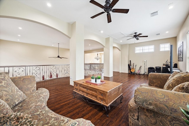 8917 Hawk Rd, Pearland, TX 77584 - living room with ceiling fan, arched walkways, wood-type flooring, and recessed lighting
