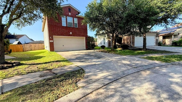 2911 Ribbon Creek Way, Spring, TX 77389 - traditional-style house with brick siding, driveway, and an attached garage