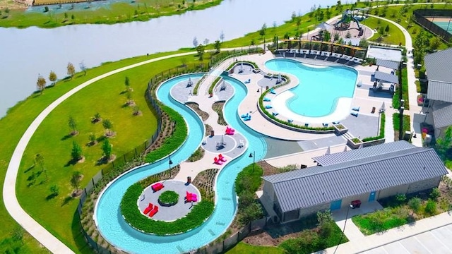 30415 Bermuda Hallow Bnd, Brookshire, TX 77423 - drone / aerial view of a nearby body of water and a pool area