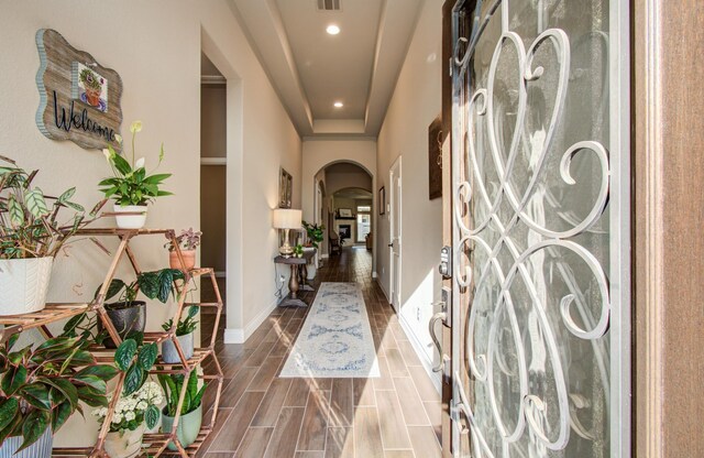 2335 Mayfield Trail Ct, League City, TX 77573 - foyer featuring arched walkways, recessed lighting, baseboards, and wood finished floors