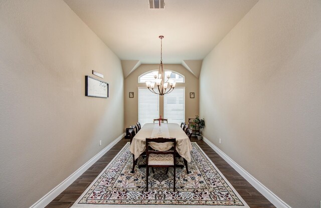 2335 Mayfield Trail Ct, League City, TX 77573 - dining space with a chandelier, dark wood finished floors, baseboards, and vaulted ceiling