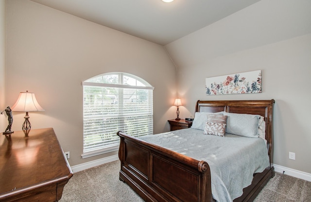 2335 Mayfield Trail Ct, League City, TX 77573 - bedroom with baseboards, carpet floors, multiple windows, and lofted ceiling