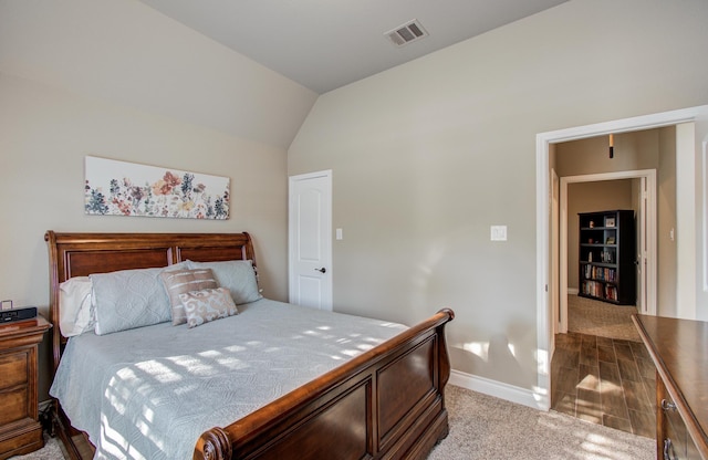 2335 Mayfield Trail Ct, League City, TX 77573 - bedroom featuring baseboards, lofted ceiling, and carpet flooring