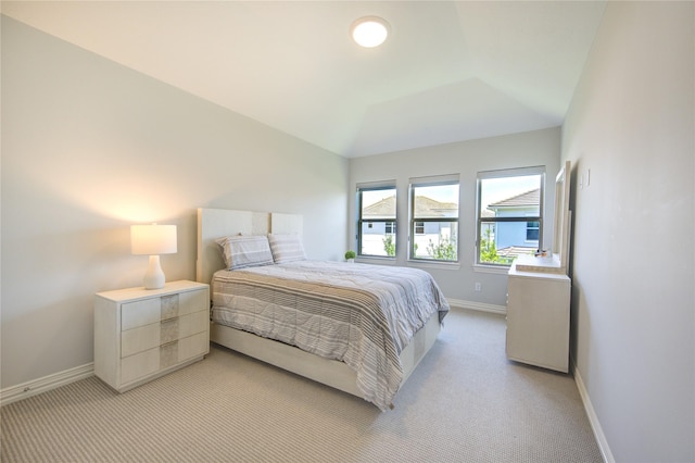 13706 Northwood Meadow Cir, Houston, TX 77077 - bedroom featuring light colored carpet, baseboards, and vaulted ceiling