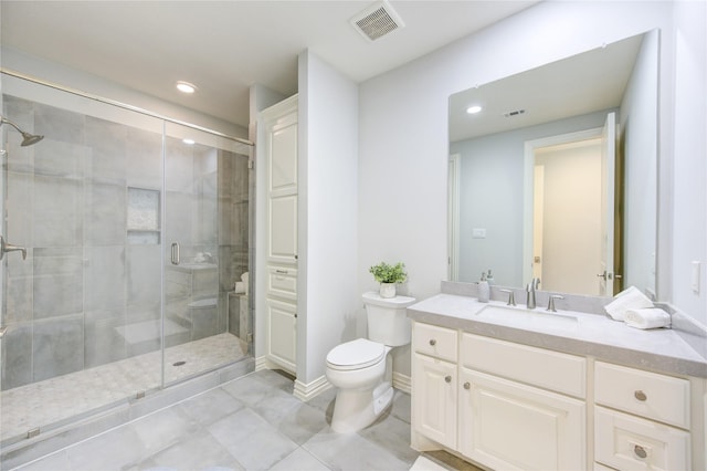 13706 Northwood Meadow Cir, Houston, TX 77077 - bathroom with toilet, vanity, a shower stall, tile patterned flooring, and recessed lighting