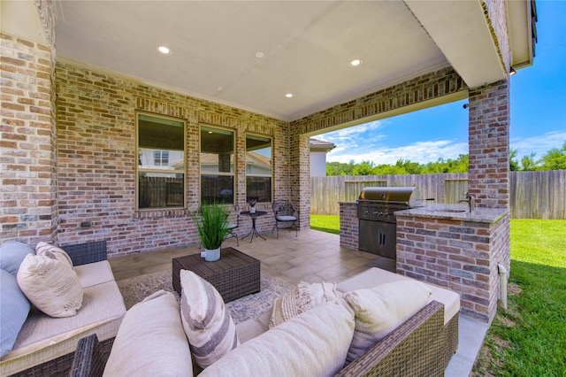 13706 Northwood Meadow Cir, Houston, TX 77077 - fenced backyard with a sink, an outdoor living space, and a patio