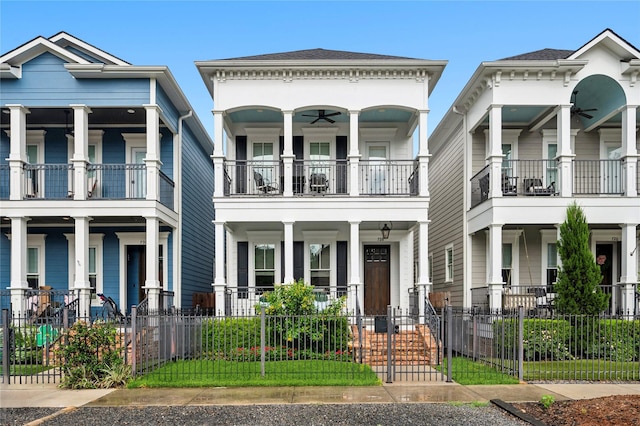 728 Allston St, Houston, TX 77007 - view of front of property with a fenced front yard, covered porch, a ceiling fan, and a balcony