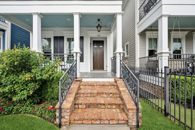 728 Allston St, Houston, TX 77007 - doorway to property featuring a porch