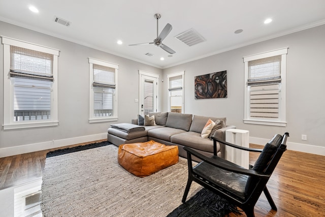 728 Allston St, Houston, TX 77007 - living area featuring ornamental molding, wood finished floors, a ceiling fan, baseboards, and recessed lighting