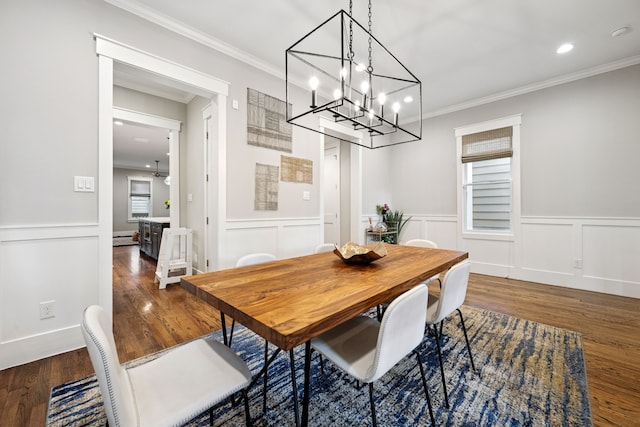 728 Allston St, Houston, TX 77007 - dining room with wood finished floors, a chandelier, crown molding, recessed lighting, and wainscoting