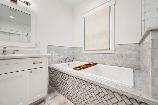 728 Allston St, Houston, TX 77007 - full bathroom with a garden tub and vanity