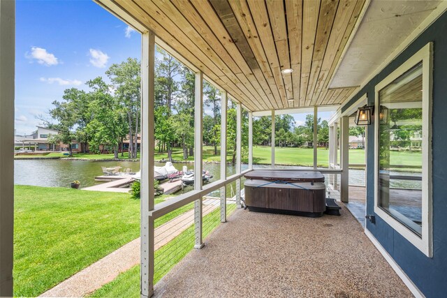 12986 Wood Harbour Dr, Montgomery, TX 77356 - sunroom with a jacuzzi, a water view, and healthy amount of natural light