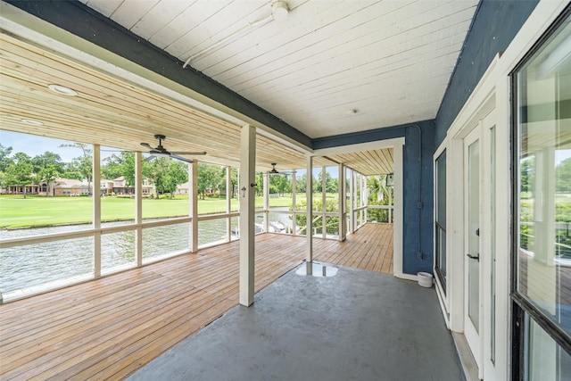 12986 Wood Harbour Dr, Montgomery, TX 77356 - unfurnished sunroom with a water view and ceiling fan