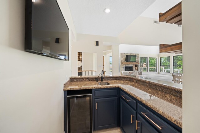 12986 Wood Harbour Dr, Montgomery, TX 77356 - bar with wine cooler, a sink, and recessed lighting