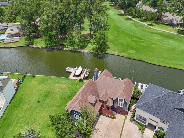 12986 Wood Harbour Dr, Montgomery, TX 77356 - aerial view of residential area featuring a nearby body of water and a golf club