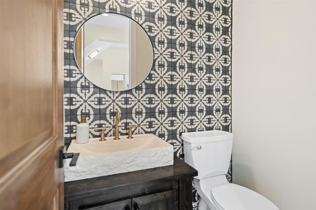 12986 Wood Harbour Dr, Montgomery, TX 77356 - half bath featuring toilet, vanity, and tile walls