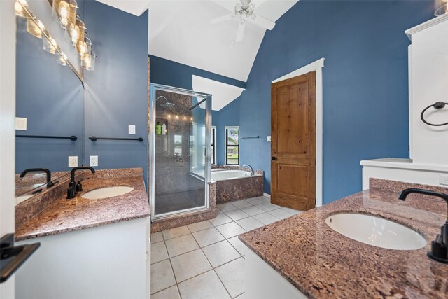 12986 Wood Harbour Dr, Montgomery, TX 77356 - bathroom with two vanities, a stall shower, a bath, tile patterned floors, and vaulted ceiling