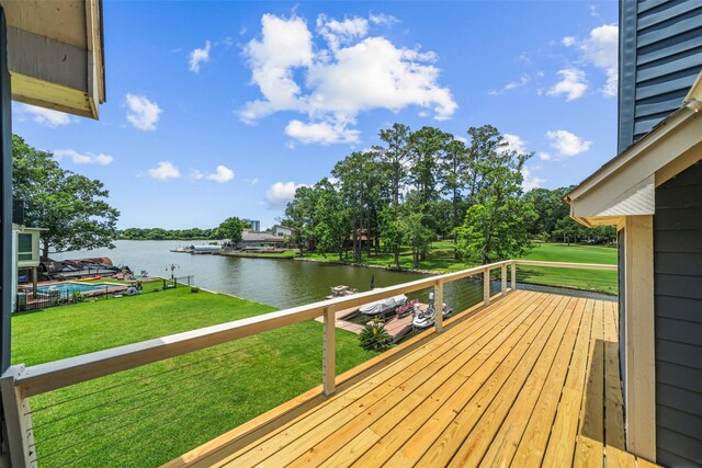 12986 Wood Harbour Dr, Montgomery, TX 77356 - wooden deck featuring a water view and a lawn