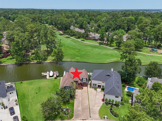 12986 Wood Harbour Dr, Montgomery, TX 77356 - aerial view of residential area with a nearby body of water and a golf course