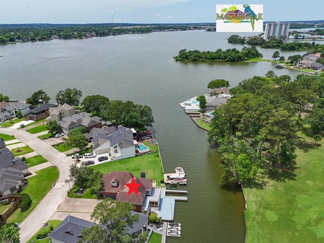 12986 Wood Harbour Dr, Montgomery, TX 77356 - aerial perspective of suburban area featuring a nearby body of water