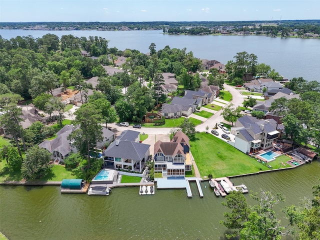 12986 Wood Harbour Dr, Montgomery, TX 77356 - aerial perspective of suburban area with a nearby body of water