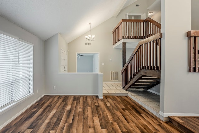 19523 Enchanted Grove Dr, Spring, TX 77388 - foyer entrance with plenty of natural light, a chandelier, wood finished floors, and high vaulted ceiling