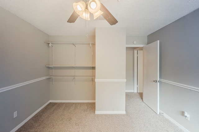 19523 Enchanted Grove Dr, Spring, TX 77388 - walk in closet featuring ceiling fan and carpet flooring