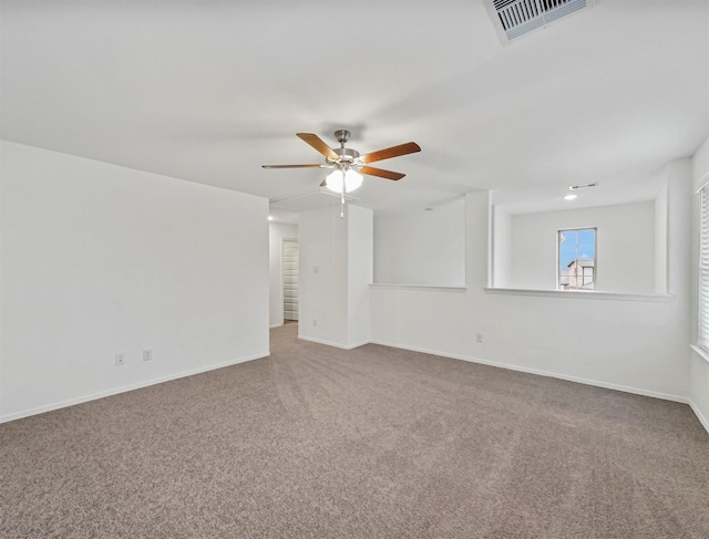 5602 Tabula Rasa Dr, Katy, TX 77493 - spare room featuring carpet flooring, ceiling fan, and baseboards