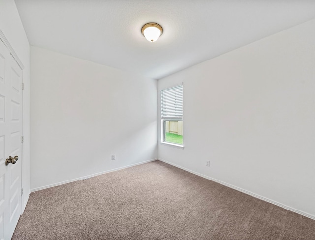 5602 Tabula Rasa Dr, Katy, TX 77493 - carpeted spare room with baseboards