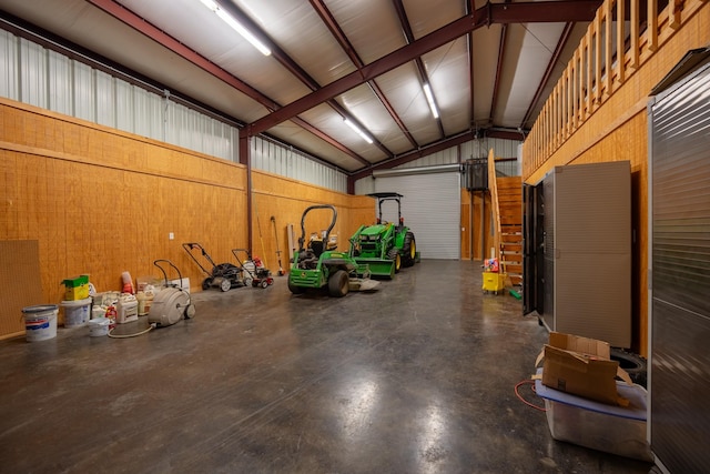 17715 Badtke Rd, Hockley, TX 77447 - garage featuring metal wall and wood walls