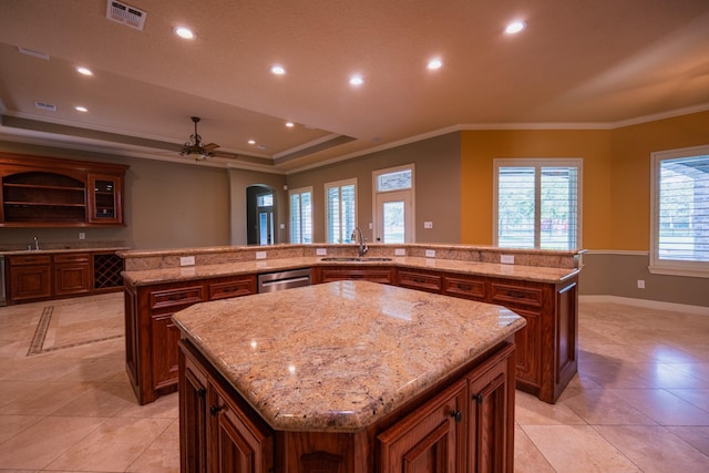 17715 Badtke Rd, Hockley, TX 77447 - kitchen featuring a spacious island, a sink, dishwasher, crown molding, and ceiling fan