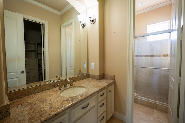 17715 Badtke Rd, Hockley, TX 77447 - full bath featuring vanity, a stall shower, ornamental molding, baseboards, and a spacious closet