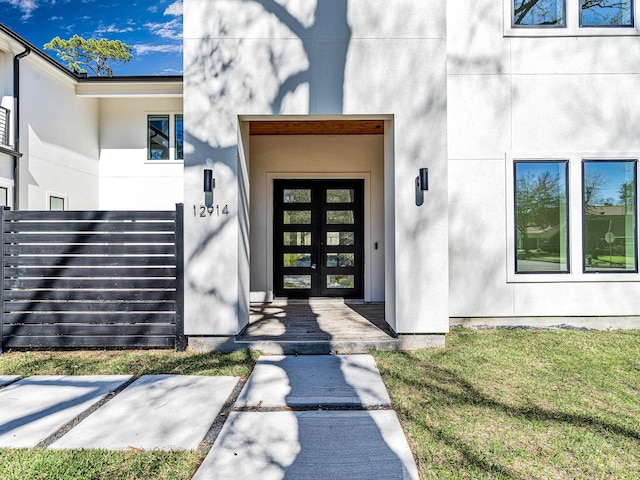 12914 Figaro Dr, Houston, TX 77024 - entrance to property with french doors and stucco siding