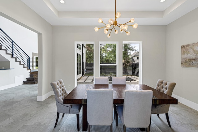 12914 Figaro Dr, Houston, TX 77024 - dining area featuring a chandelier, stairway, baseboards, recessed lighting, and a raised ceiling