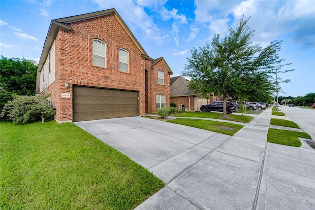 18226 Golden Falls Ln, Spring, TX 77379 - view of front of property featuring brick siding, an attached garage, concrete driveway, and a front lawn