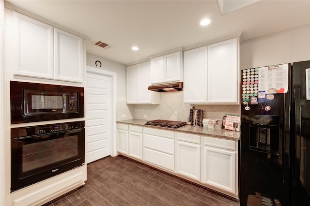 18226 Golden Falls Ln, Spring, TX 77379 - kitchen featuring black appliances, tasteful backsplash, white cabinets, light stone countertops, and recessed lighting