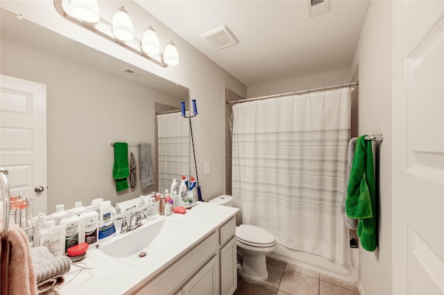18226 Golden Falls Ln, Spring, TX 77379 - bathroom featuring vanity, toilet, tile patterned flooring, and shower / bath combination with curtain