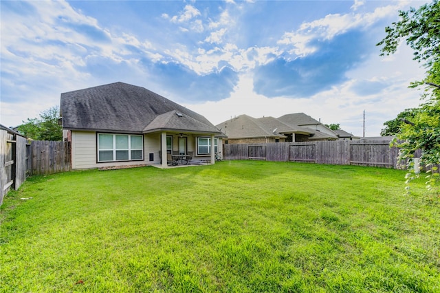 18226 Golden Falls Ln, Spring, TX 77379 - rear view of house with a patio