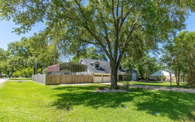 842 Broad Ripple Dr, Houston, TX 77336 - view of home's exterior with a carport, concrete driveway, and a garage
