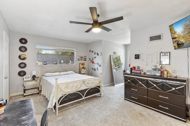 842 Broad Ripple Dr, Houston, TX 77336 - bedroom with light colored carpet, baseboards, and ceiling fan