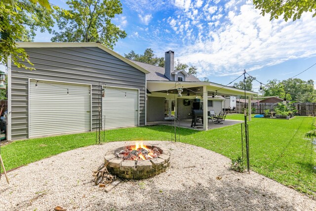 842 Broad Ripple Dr, Houston, TX 77336 - rear view of property featuring an outdoor fire pit, a chimney, and a patio