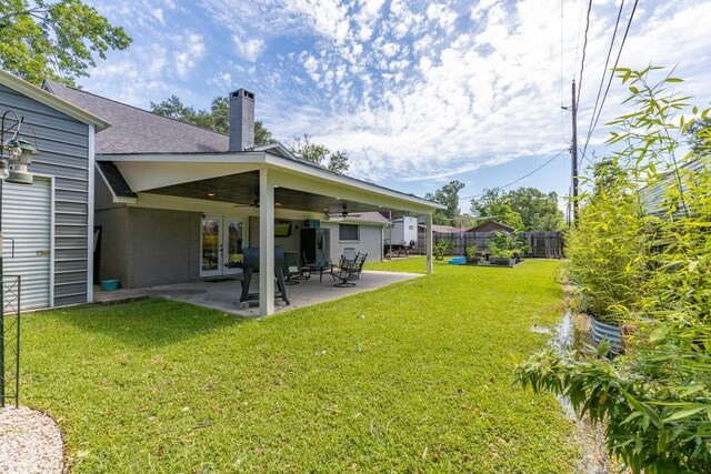 842 Broad Ripple Dr, Houston, TX 77336 - view of yard with french doors, ceiling fan, and a patio