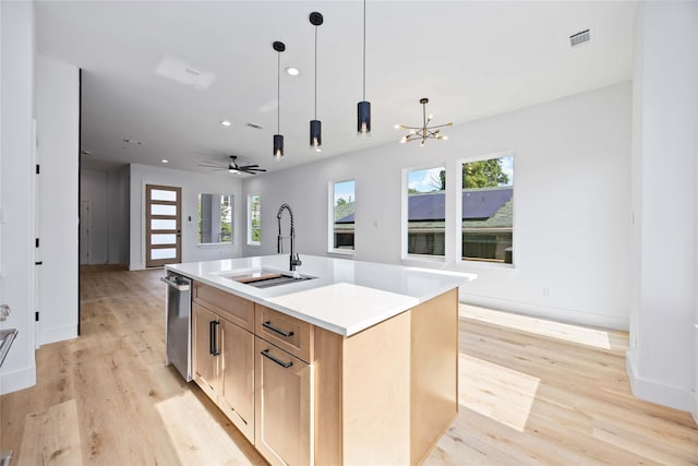 2206 Bleker St, Houston, TX 77026 - kitchen featuring a sink, open floor plan, light wood-type flooring, baseboards, and recessed lighting