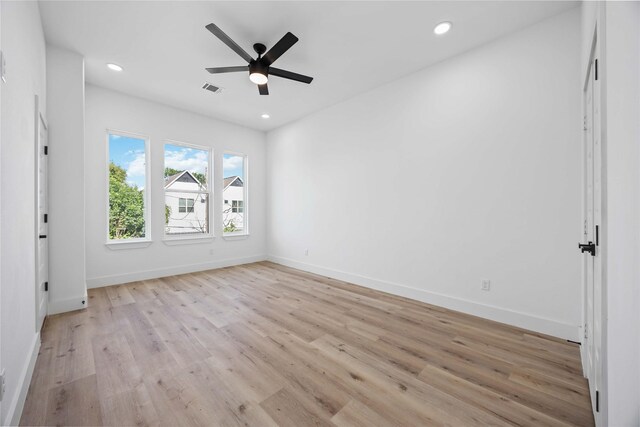 2206 Bleker St, Houston, TX 77026 - unfurnished room featuring light wood-type flooring, baseboards, recessed lighting, and ceiling fan