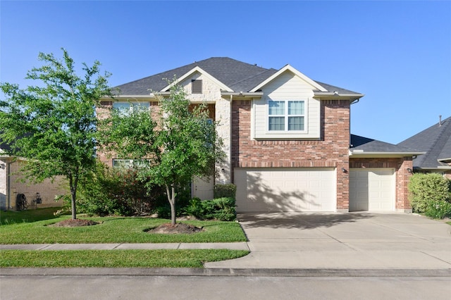 24618 Malca Manor Dr, Katy, TX 77493 - traditional home with brick siding, driveway, and a garage