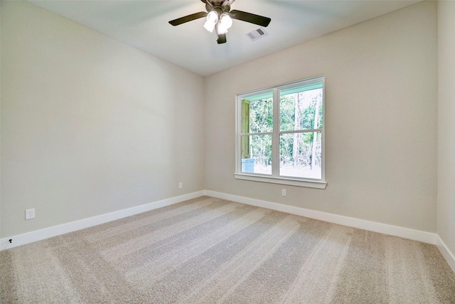 688 Lonestar Rd, Huntsville, TX 77340 - unfurnished room with baseboards, ceiling fan, and light colored carpet
