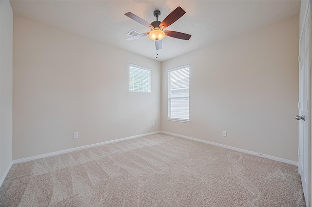 810 Dracena Ct, Richmond, TX 77406 - unfurnished room featuring light carpet, baseboards, and ceiling fan